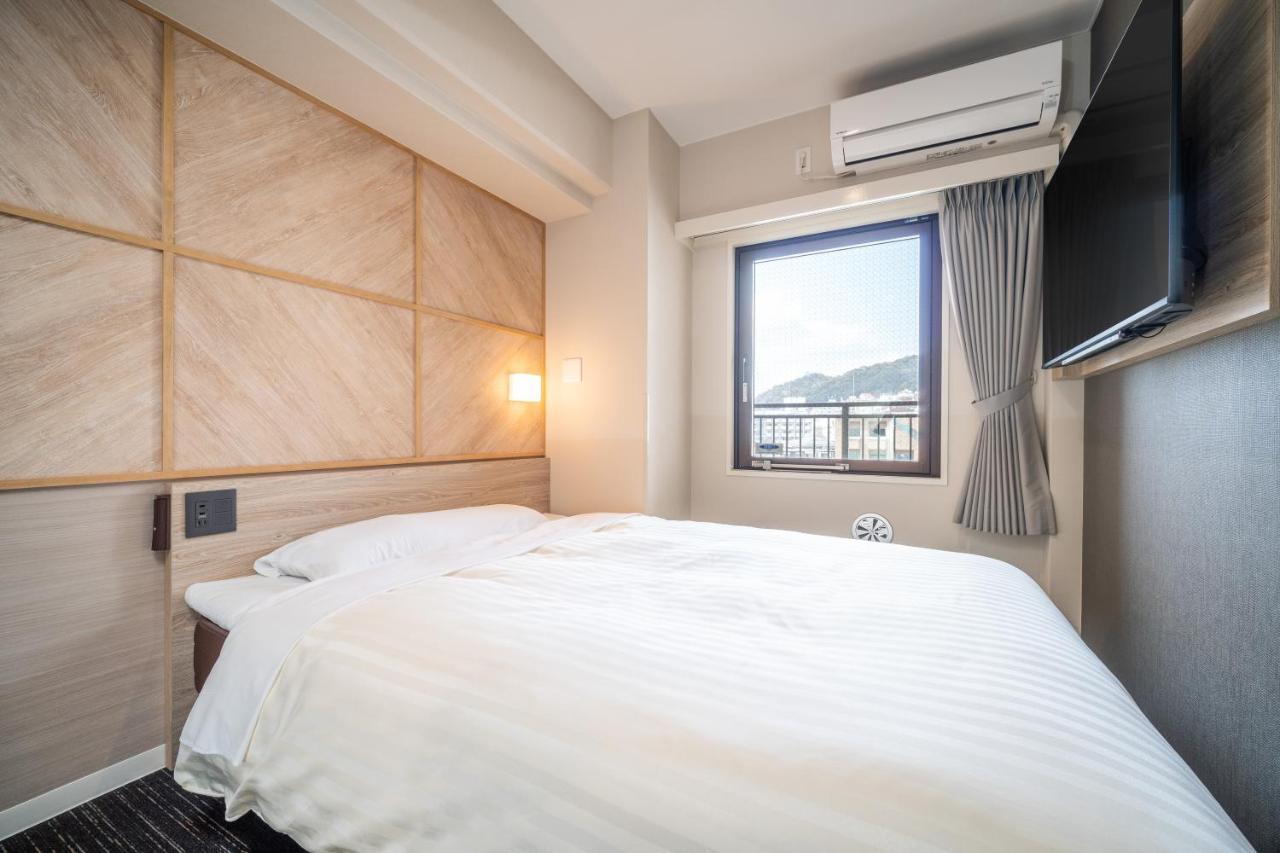 Super Hotel Кобе Екстериор снимка